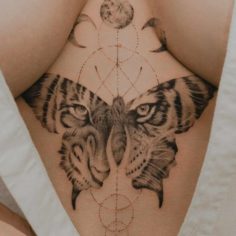tatuagem tigre formato de borboleta