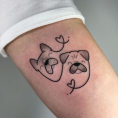 two dogs dots tattoo