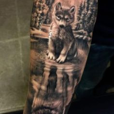 baby wolf tattoo